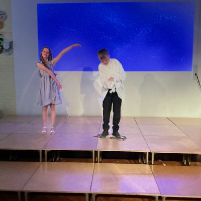 Children rehearsing for their play